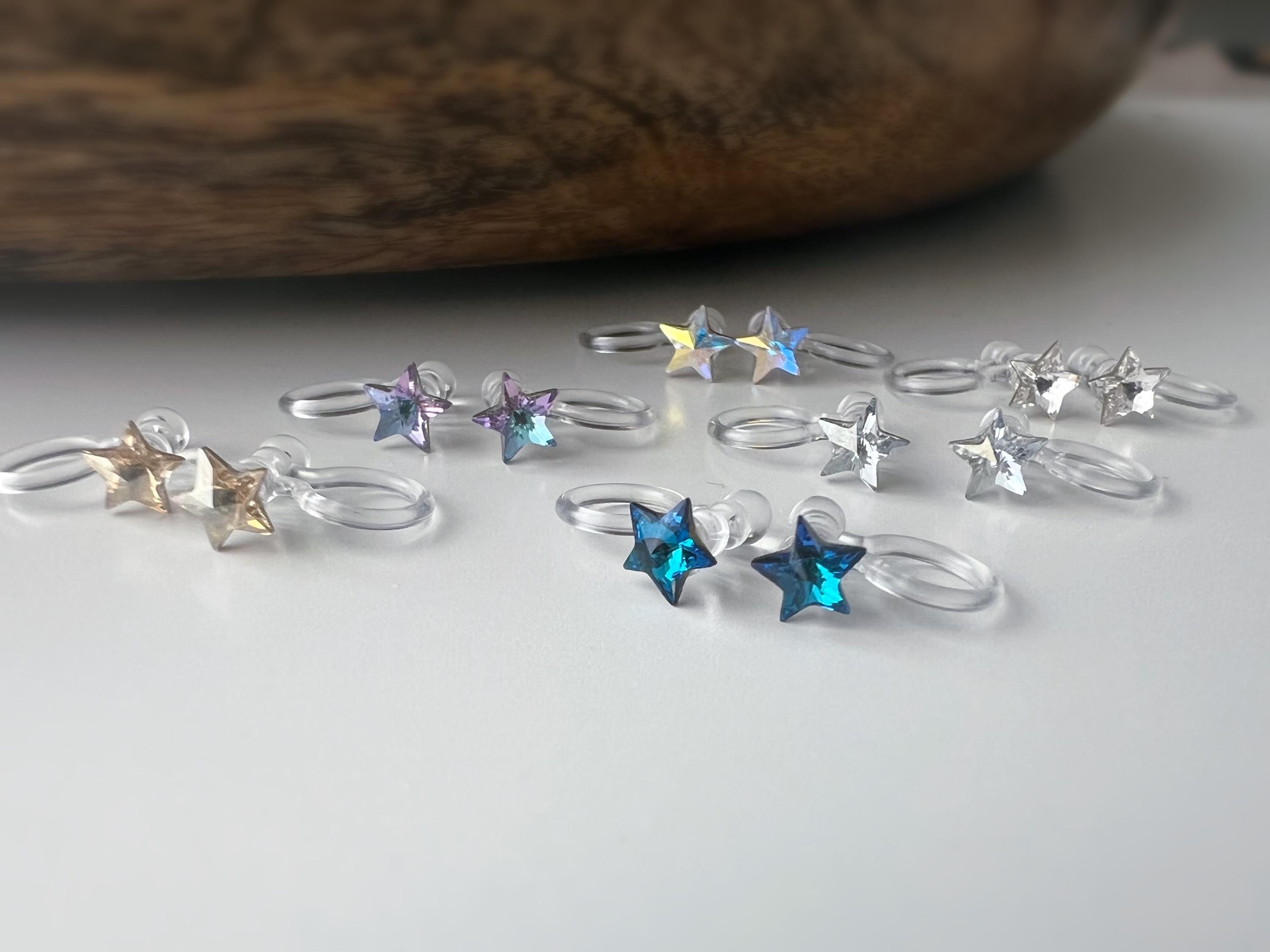 Mini étoile Cristaux PureCrystal Boucles d’oreilles clip légères et confortables, idéales pour illuminer vos tenues sans perçage.