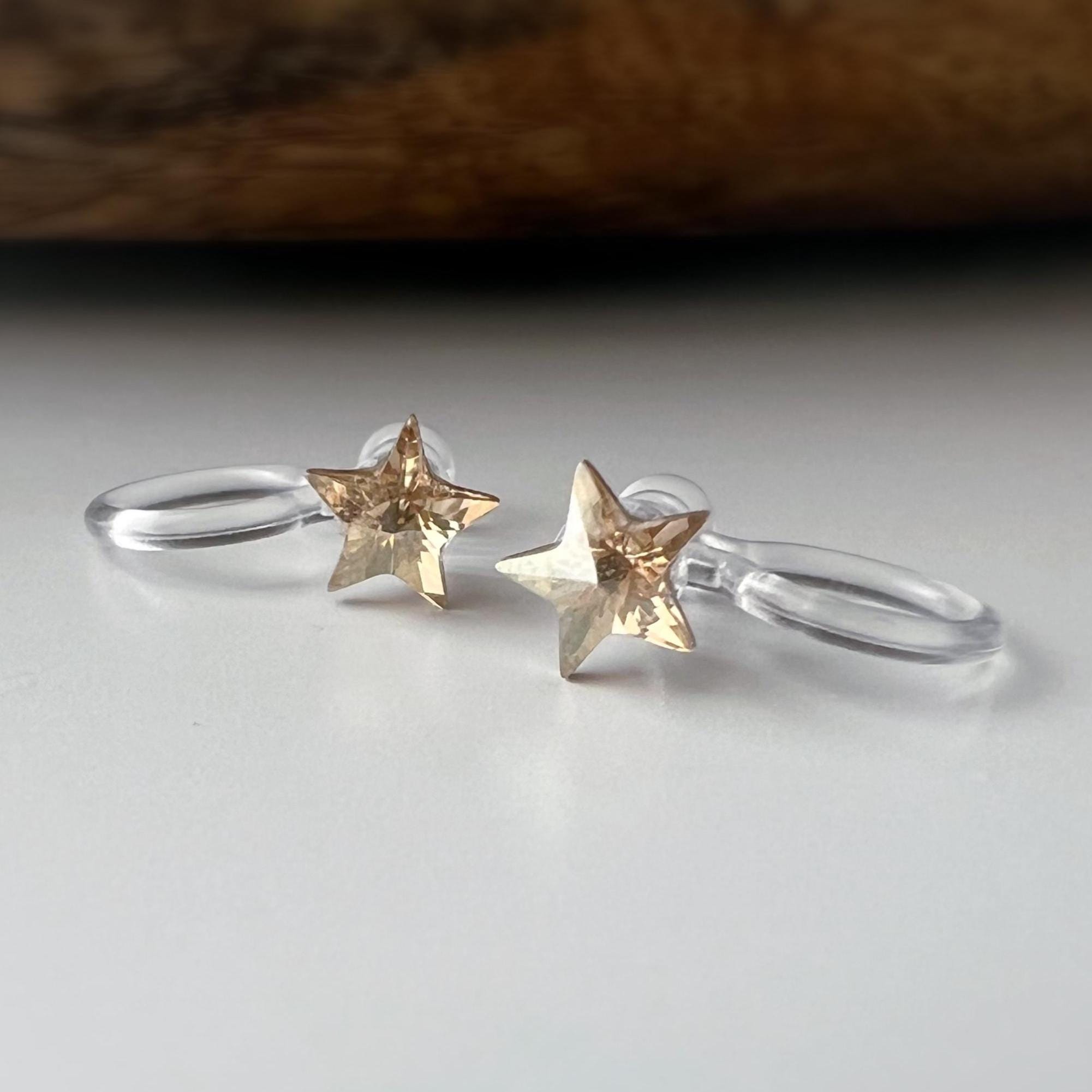Mini étoile Cristaux PureCrystal Boucles d’oreilles clip légères et confortables, idéales pour illuminer vos tenues sans perçage.