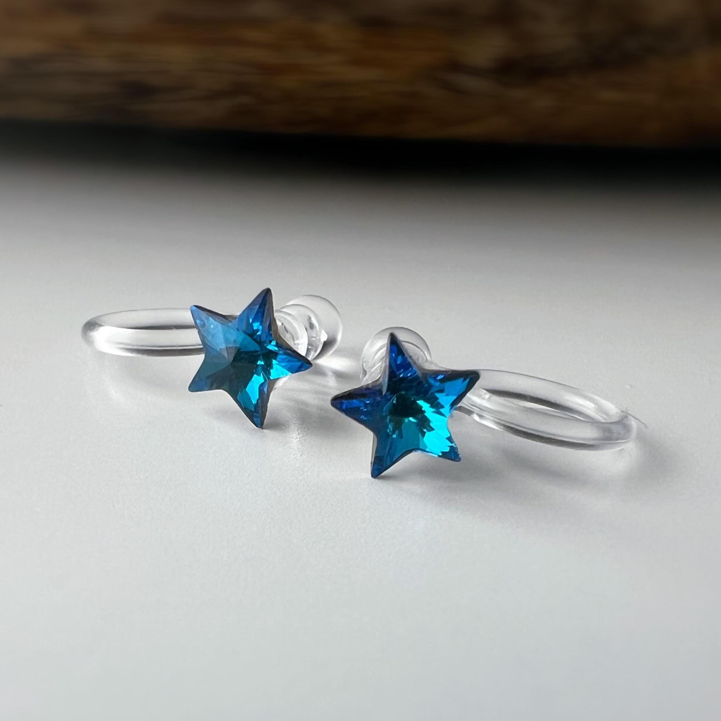 Mini étoile Cristaux PureCrystal Boucles d’oreilles clip légères et confortables, idéales pour illuminer vos tenues sans perçage.