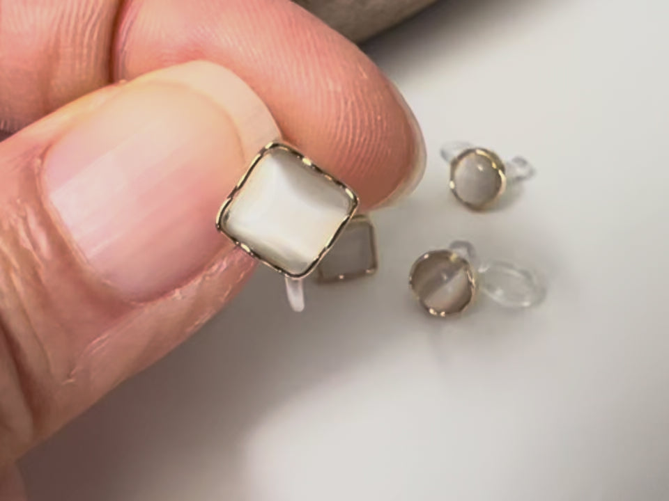 Clips d’oreilles œil de chat blanc crème
